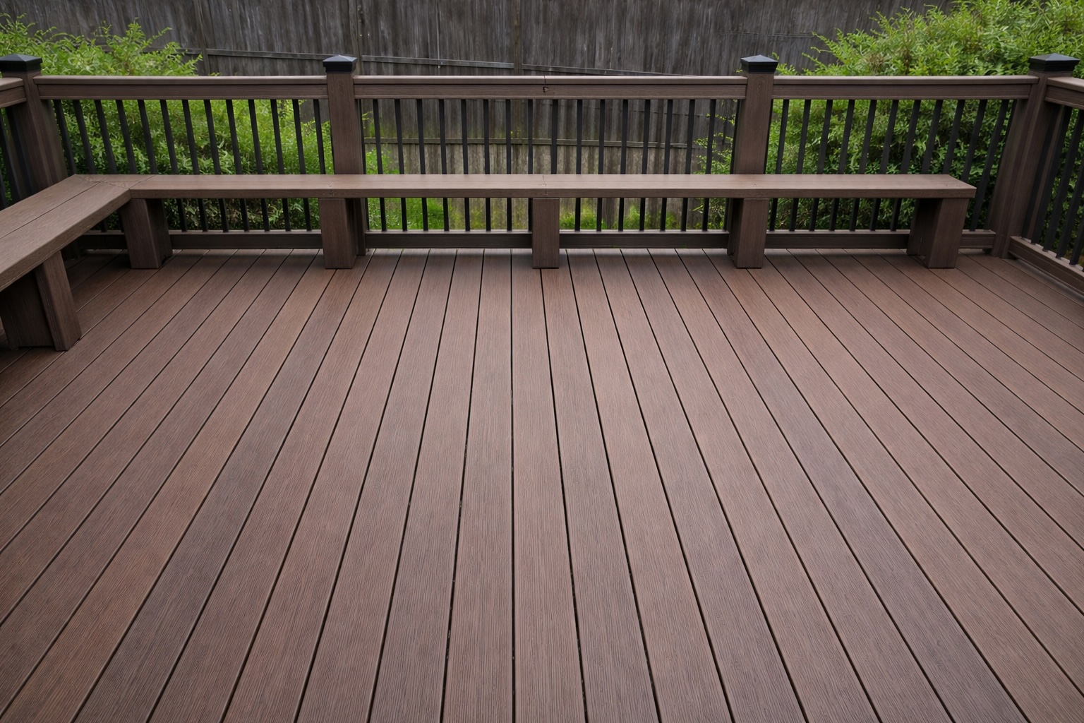 new composite deck installation with black metal railing in covington louisiana