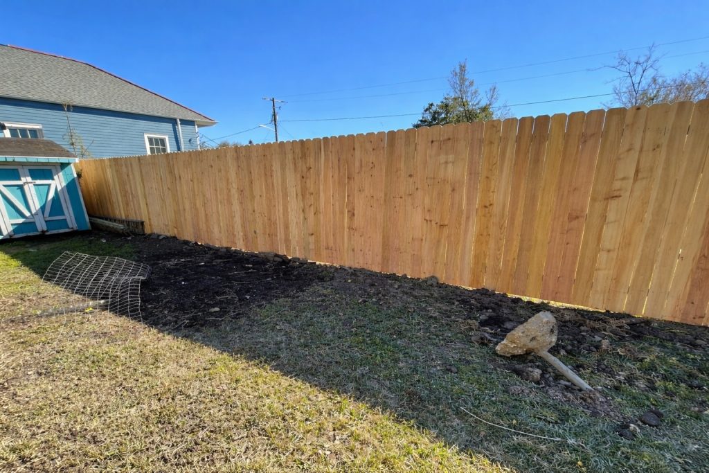 8 foot cedar privacy fence installation in Covington Louisiana by GRC Outdoor Living