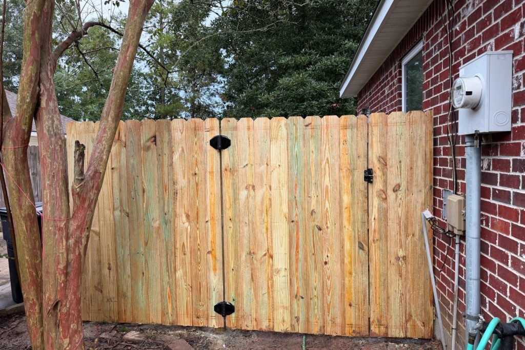 6-foot pine privacy fence gate installed in Myrtle Cove neighborhood in Madisonville, Louisiana