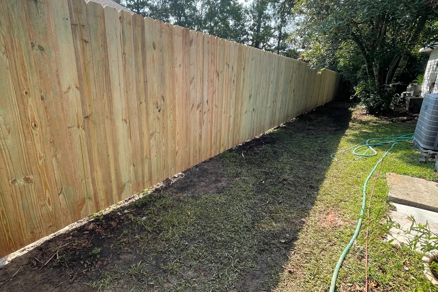 New 6' pine privacy fence installation completed in Myrtle Cove, Madisonville, LA.